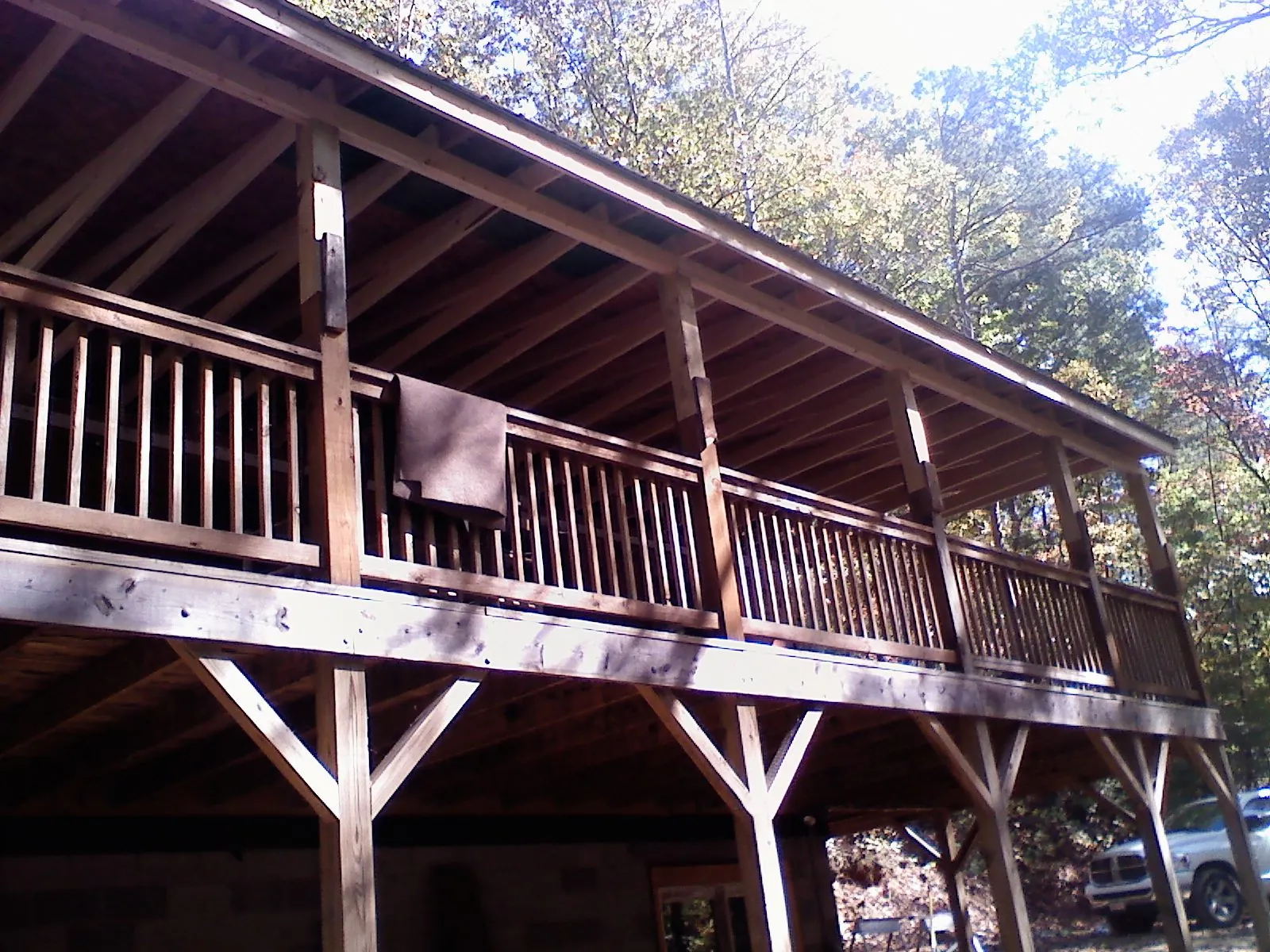 Timber framing under a new elevated porch and deck — Roof Leak Repair in Middle River by Roofing Brothers